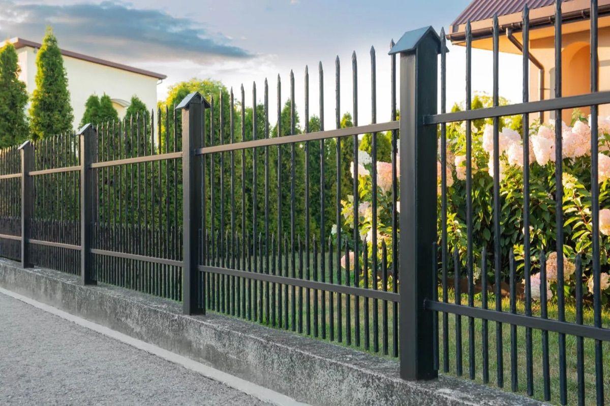 Steel privacy fence on a DFW property