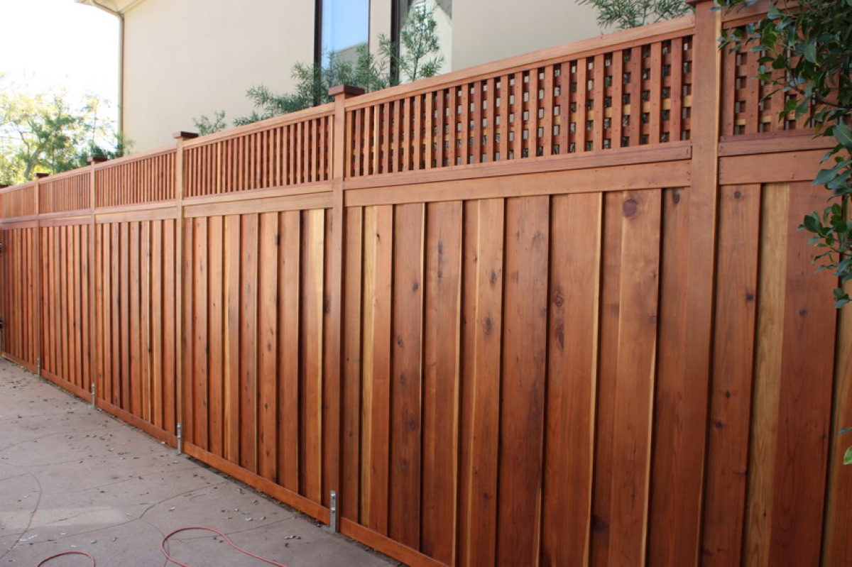 Traditional cedar fencing matched to architecture